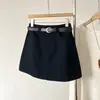 Nuevo diseño de cintura alta, falda corta de color liso versátil de cintura alta, falda corta tipo A adelgazante de verano de cintura alta anti-exposición para mujer