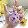 Llavero de Cámara de Proyección Sanrio Dibujo Animado Brillante Colgante para Mochila Juguete de Puesto Callejero Al Por Mayor Luminoso