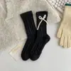 Meias Quentes Grossas de Outono e Inverno para Mulheres Veludo de Visão Laço Meia de Cano Médio para Mulheres Atacado Ins Estilo Princesa Meias de Chão