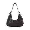 Bolso de axila para mujer 2026 retro de un solo hombro gran capacidad versátil para el día a día bandolera nuevo casual de alta gama bolso tipo bola de masa