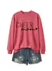 Sudadera casual y cómoda con cuello redondo y mangas largas, con un pequeño corazón, para mamá de porrista, de la tienda independiente de Amazon Wish, para exportación