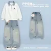 Conjunto de dos piezas para niñas: top de manga larga con cuello polo de cuadros versátil, elegante y moderno, empalmado con jeans con estampado de conejo de dibujos animados