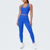 Conjunto de outfit de yoga ajustado con diseño deportivo en la espalda, de tela cepillada con bloques de color transfronterizos, sensación nude, pantalones largos de cintura alta para levantar glúteos para correr y fitness