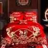 Bordado de algodón de alta gama 140 rojo boda juego de cuatro piezas dote dragón y fénix categoría de cama de algodón al por mayor