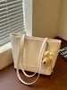 Bolso tote para mujer, moda coreana, gran capacidad, bolso casual de axila, patrón tejido 2026, bolso de hombro de nicho de moda para mujer