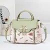 Bolso bandolera para mujer 2026 nuevo modelo bolso cuadrado pequeño versátil bolso de hombro de lujo ligero bolso de mano de alta gama de gran capacidad para mujer