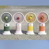 Mini ventilador de mão com design de frutas e flores de desenho animado, com base e suporte para celular, portátil para uso em mesa de escritório e de estudante