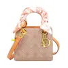 Bolsa Princesa Diana Vintage de Alta Qualidade para Mulheres 2026 Novo Modelo Bolsa de Ombro Transversal com Textura Versátil e Bolsa de Mão Elegante Estampada