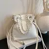 Comercio Exterior Bolso Pequeño de Gama Alta para Mujer Nuevo Modelo de Moda Bolso Cubo con Cadena Estilo Coreano Diseño de Nicho Bolso de Hombro Cruzado de Hombro Tendencia