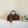 Bolsa de mão estilo comércio exterior, retrô, com acabamento fosco para mulheres, perfeita para o outono, com uma estética europeia e americana única, exalando uma vibe sofisticada e de alta qualidade, adequada como bolsa de ombro ou bolsa transversal.