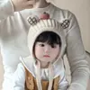 Gorro para bebé para otoño e invierno, gorro de lana tejido para bebés, gorro con protección para las orejas para niños, modelo nuevo engrosado para niños en invierno