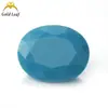 Forma de huevo abuela verde nano piedra desnuda ovalada pino verde en stock directo Wuzhou gema artificial al por mayor