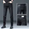 Jeans rectos ajustados para hombre de Hong Kong, ropa de negocios de alta gama para hombre, nuevos pantalones largos casuales para hombre de primavera y otoño 2026
