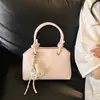 Bolsa de Concha para Mulheres 2026 Novo Modelo Bolsa de Mão Ombro Transversal Versátil para o Dia a Dia Design de Nicho Bolsa com Toque de Luxo