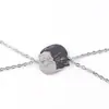 Collar cruzado para hombre Europa y Estados Unidos diseño de gato blanco y negro de dibujos animados colgante de acero inoxidable joyería linda para pareja venta al por mayor mujeres