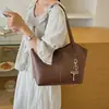 Bolso grande de moda para mujer, versátil bolso de hombro casual 2026 nuevo, bolso tote simple y elegante para el antebrazo para el día a día