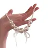 Colar de Pérolas com Laço Estilo Francês Levemente Luxuoso e Elegante, Moderno e Versátil, Design de Nicho com Toque de Alto Padrão