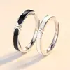 Anillo de pareja de unión blanco y negro para hombre y mujer diseño de nicho ins anillo cruzado moda versátil anillo de pegamento blanco y negro
