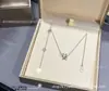 Collar de resorte pequeño Baojia versión de alta gama en oro V, versión de alta gama CNC, modelo de caridad para celebridades, cadena para clavícula chapada en oro de 18k con cerámica