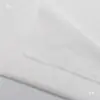 Forro de falda blanco forro elástico blanco boca forro dorado bolsa cortina de un solo lado suave y duro con pegamento