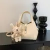 Bolso Cruzado de Hombro Único de Personalidad Casual a la Moda con Textura Simple, Bolso de Estilo Nuevo para Mujer, Bolso Cubo de Nicho para Primavera 2026