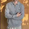 Suéter de punto para hombre transfronterizo con bordado de logo de poni, otoño e invierno, con cuello camisero, cremallera y tejido de ochos, en un estilo "old money" con un toque de alta gama.
