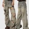 Jeans rasgados, desgastados e lavados da moda para homens jovens, estilo parisiense, calças compridas versáteis de corte solto