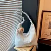 Bolsa de lona plisada bordada para mujer, bolsa nueva de gran capacidad para clases y desplazamientos, bolso de hombro y axila versátil de nicho