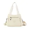 Verano 2026 Nuevo Bolso de Mano Casual Transfronterizo de Gran Capacidad para Mujer Bolso de Hombro Simple de Nailon Bolso Cruzado