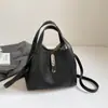 Bolsa de Mão de Marca Estrangeira de Luxo Modelo Balde para Mulheres Novo Modelo Inverno 2025 Bolsa de Ombro para o Dia a Dia Bolsa Transversal Casual