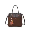 Bolsa de mão fashion para mulheres no outono de 2026, novo design trançado, elegante bolsa tote com toque de luxo, grande capacidade, bolsa estilosa para o dia a dia