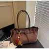 Bolsa Tote Retro Simples Versátil Transfronteiriça para Mulheres 2025 Inverno Nova Nicho Luxo Leve Estilosa Diária de Ombro