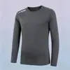 Temporada de primavera y otoño, camiseta lisa popular de manga larga, corte holgado, cuello redondo, unisex, top simple y versátil