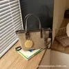 Bolso Tejido de Paja de Gran Capacidad Estilo Coreano Verano 2026 Nuevo Bolso Tejido de Nicho Bolso Cubo de Patchwork de Moda para Vacaciones