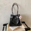 Bolso de axila de alta gama para madre e hija para mujer, nuevo bolso de hombro versátil de moda vintage, bolso tote de gran capacidad para el día a día