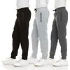 Pantalones largos casuales de corte slim para hombre, de comercio exterior de AliExpress, de primavera y otoño, modernos, para exteriores, con cintura elástica, bolsillos y cremallera, al por mayor, en stock