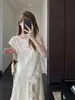 Blusa con volantes atmosférica estilo coreano, suave y rejuvenecedora, top sin mangas holgado y estilizado para mujer, nuevo para verano 26, H062405