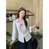 Outono de 2026 Novo Camisa de Manga Longa com Cadarço de Corda de Couro Plus Size Feminina Design Francês Camisa Emagrecedora Fina