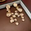 Pendientes de Borla Redondos de Metal Plegados Aguja de Plata Pendientes de Botón Exagerados de Moda Europea y Americana Pendientes de Nicho de Gama Alta para Mujeres