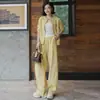 Conjunto deportivo casual personalizado para mujer, nuevo y elegante traje de chaqueta tipo cárdigan y pantalones de pierna ancha para otoño 2026