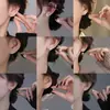 Aretes de hoja de plata 999 con aguja, cuidado de perforación de oreja, no es necesario quitárselos al dormir, nuevos aretes populares de nicho 2026 para mujer