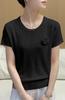 Camiseta de punto sexy de manga corta de alta gama para mujer, prenda de punto fino de verano, top holgado moderno y versátil.