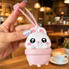 Llavero Creativo Lindo Temático de Mascotas para Apretar Agua Alivio del Estrés Pistola de Agua de Broma Colgante de Dibujos Animados para Mochila de Niños de Verano