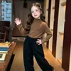 Camiseta Base de Punto para Niña 2026 Nuevo Estilo Primavera y Otoño Top Sencillo para Niñas Versátil de Cuello Medio para Niños Top de Moda