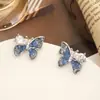 Brincos de borboleta de cristal verde com laço de mola, pino de prata 925, brincos degradê de gelo quebrado, brincos pop de nicho