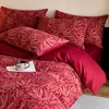 Juego de cuatro piezas de jacquard de doble capa de gasa teñido en hilo de algodón de alta gama para boda en rojo, sábana y funda de edredón de algodón puro, ropa de cama para boda