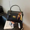 Moda Outono 2025 Nova Bolsa de Mão de Luxo Versátil Pequena Quadrada Bolsa de Ombro Texturizada Feminina Bolsa Transversal de Nicho