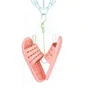 Zapatero pequeño multifuncional para balcón, resistente al viento, con doble gancho, de plástico giratorio para exteriores.