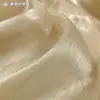 Tela de verano satén Xiangfei seda plateada organza luz de agua tela para camisa de vestir de mujer con protección solar polarizada