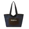 Bolso de lona de doble cara con estampado de leopardo estilo coreano para mujer, nuevo bolso de hombro casual de mezclilla estilo perezoso, bolsa de mano de gran capacidad para el día a día